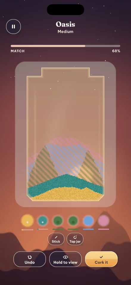 Pouring sand into a jar over a faint target picture